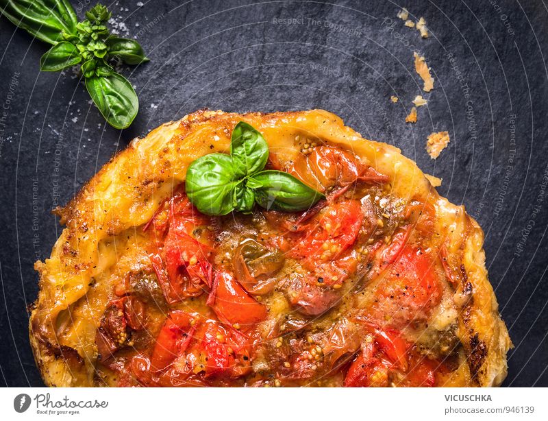 Tomato Tarte Tatin with Basil on Slate Vegetable Cake Herbs and spices Nutrition Lunch Buffet Brunch Banquet Organic produce Vegetarian diet Diet Style
