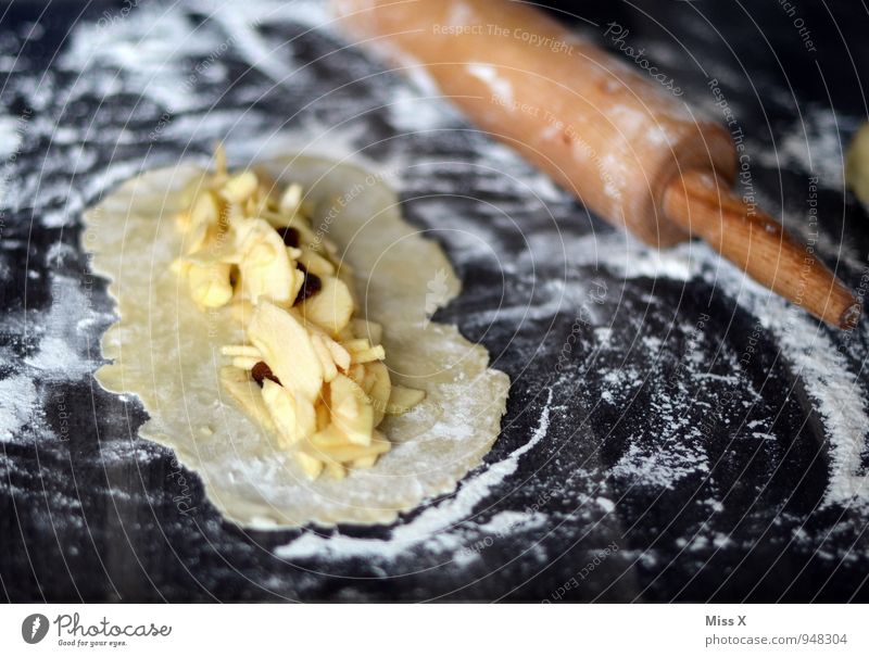 apple filled mouthpieces Food Apple Dough Baked goods Cake Nutrition Delicious Sweet Apple pie Flour Rolling pin Colour photo Interior shot Close-up Deserted