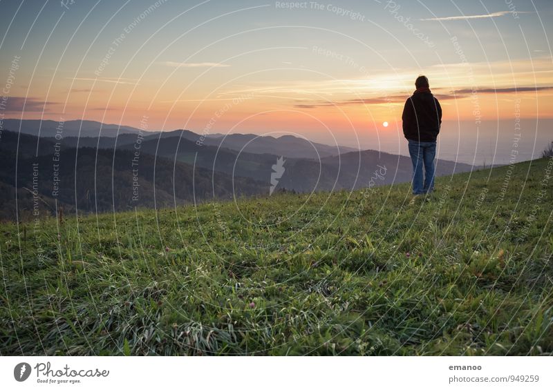 Man on mountains in the Black Forest at sunset over the Upper Rhine Rift Lifestyle Joy Well-being Contentment Relaxation Calm Vacation & Travel Tourism