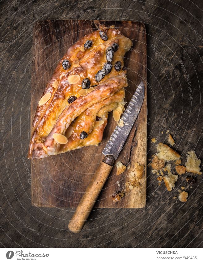 Coffee cake on old cutting board with knife Food Dough Baked goods Cake Nutrition To have a coffee Crockery Knives Style Design Kitchen coffee cake Almond