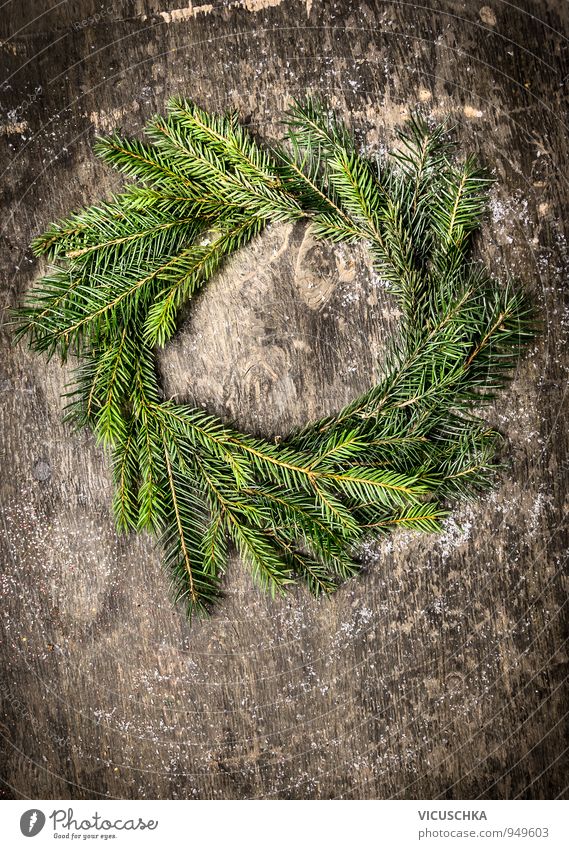 Wreath of fir branches on dark wood Design Leisure and hobbies Winter Christmas & Advent Nature Wood Retro Brown Gray Green Tradition Background picture