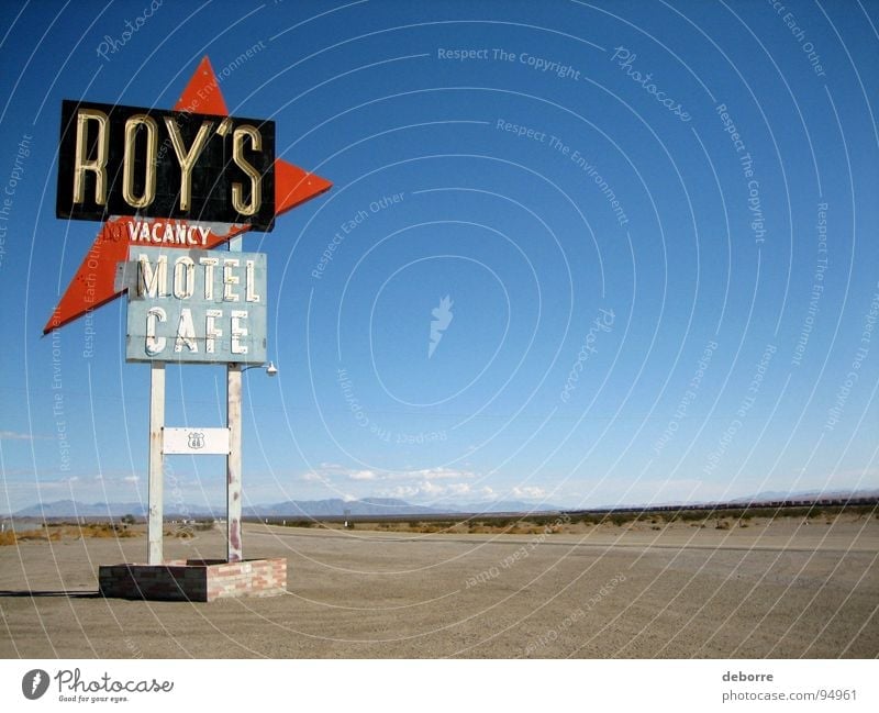 Retro American highway sign for Roy's Motel on Route 66. Hotel Accommodation Americas Café Street sign Room USA Living or residing Signs and labeling Blue Sky