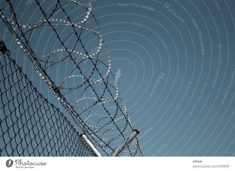 privacy Barbed wire Cynical Fence Wire netting Wall (barrier) Closed Evil Narrow Repression Overwhelming Industry Fear Panic prickly feindsehlig Tall Sky
