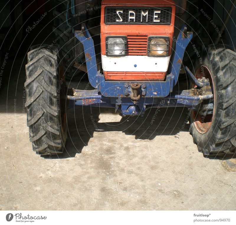 out of the dark Tractor Farm Agriculture Blue-red Transport Shadow Wheel Sun Floor covering