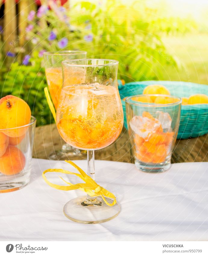 glass with apricot punch drink on garden table Food Fruit Dessert Nutrition Beverage Cold drink Lemonade Juice Alcoholic drinks Sparkling wine Prosecco Crockery