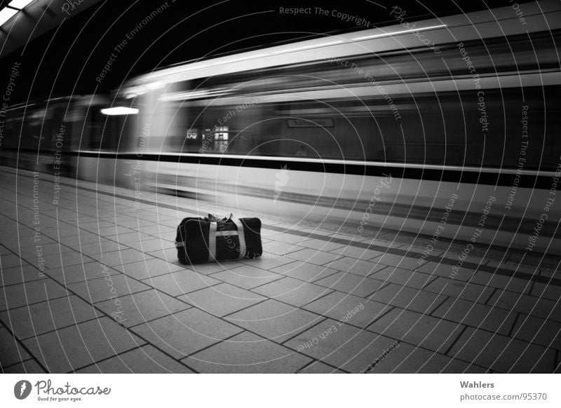 suitcase bomb Subsoil Underground London Underground Bag Stuttgart Railroad White Black Dark Mysterious Criminality Assault Bomb Suitcase Motion blur Blur