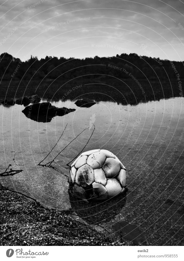 off Foot ball Leather Environment Nature Landscape Sand Water Sky Horizon Twig Lakeside Lie Sadness Wait Dirty Broken Illness Gloomy Emotions Patient Concern