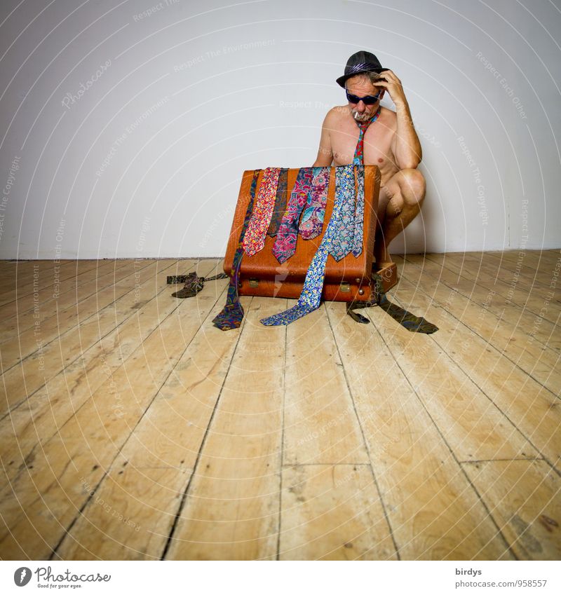 Naked man with sunglasses, hat and an old suitcase full of ties in a thoughtful pose Style Man Adults Body 1 Human being 30 - 45 years 45 - 60 years Tie