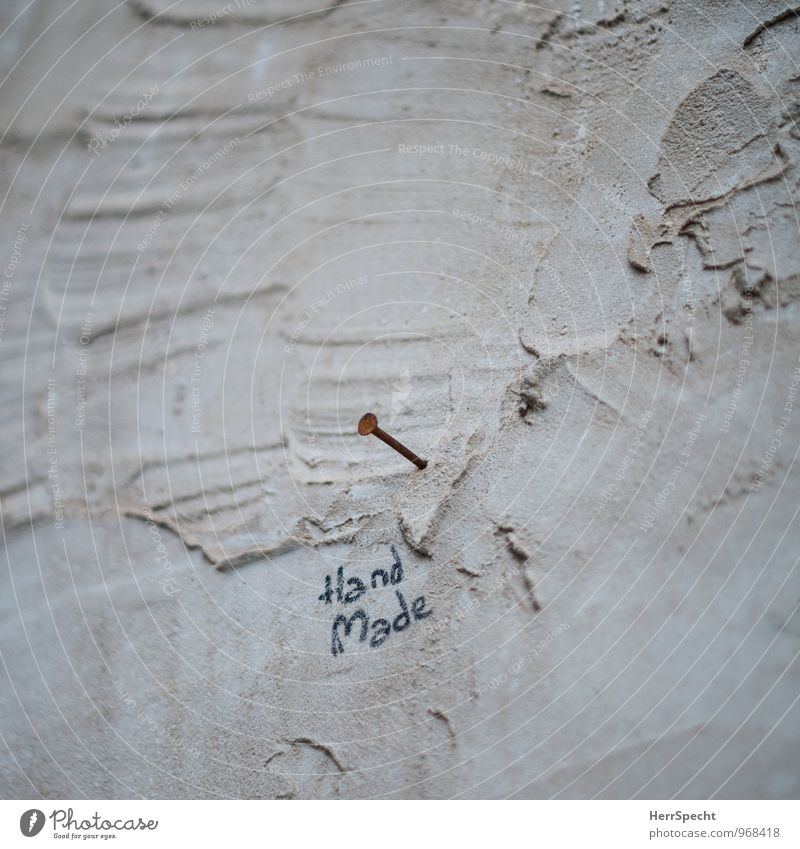 Art | Hand | Work Deserted Manmade structures Building Wall (barrier) Wall (building) Stone Concrete Characters Graffiti Funny Brown Nail Rust Work of art