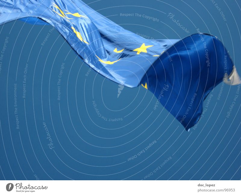 ...is blowin' in the wind Flag Air Ambiguous Peak Discourse Future Globalization Star (Symbol) Europe Wind Sky discrepancies open borders constitution