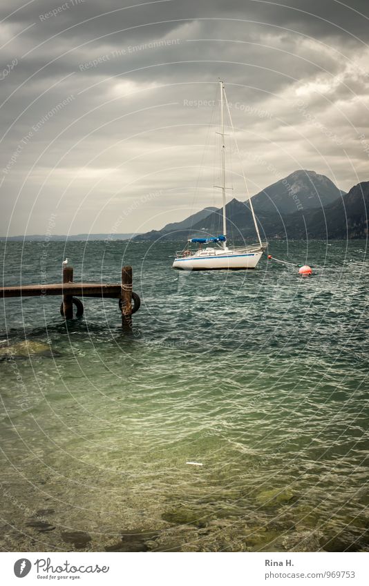 Storm over Lake Garda Nature Landscape Clouds Horizon Summer Bad weather Wind Gale Mountain Italy Sailboat Anchor Sit Dark Seagull Jetty Footbridge Buoy