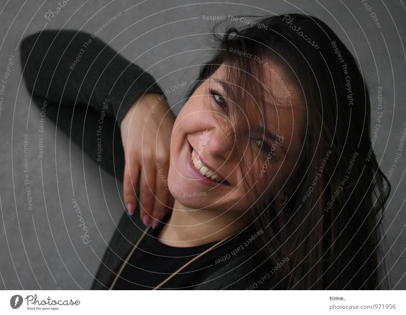 . Feminine Young woman Youth (Young adults) 1 Human being Wall (barrier) Wall (building) Jacket Jewellery Brunette Long-haired Movement Smiling Laughter Looking