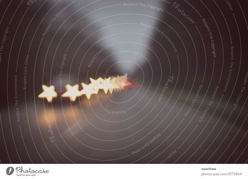 approaching stars Transport Means of transport Traffic infrastructure Road traffic Motoring Street Concrete Driving Dark Gray Star (Symbol) Car Light Blur