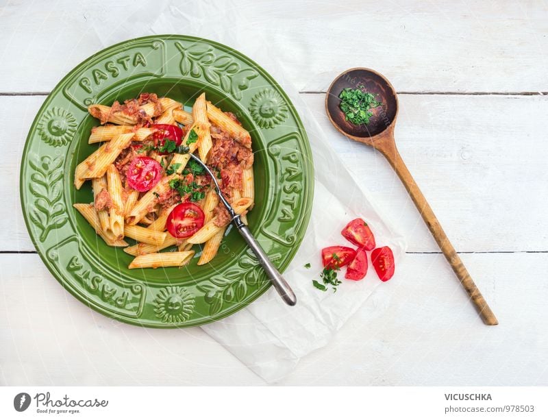 Penne Pasta with Tuna and Tomato Sauce in a Green Plate Food Fish Vegetable Herbs and spices Nutrition Lunch Dinner Organic produce Vegetarian diet Diet