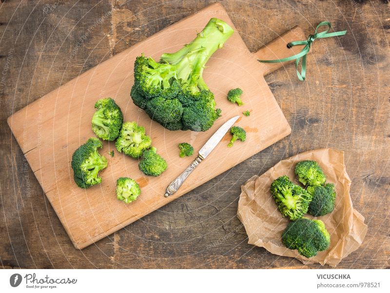 Prepare broccoli cabbage on chopping board Food Vegetable Nutrition Lunch Organic produce Vegetarian diet Diet Knives Style Design Healthy Eating Kitchen Nature