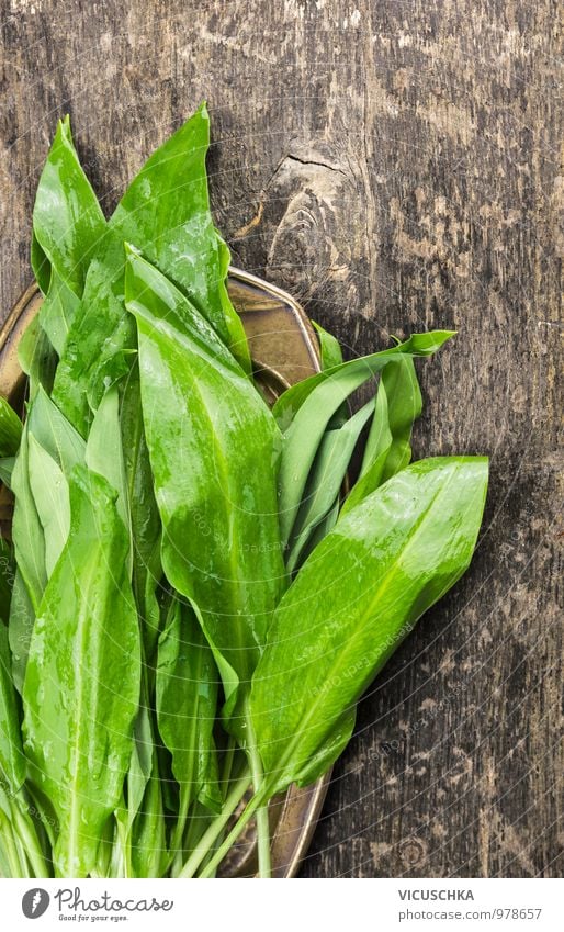 Wild garlic bundles on an old wooden table Food Lettuce Salad Herbs and spices Nutrition Organic produce Vegetarian diet Diet Style Design Healthy Eating Life