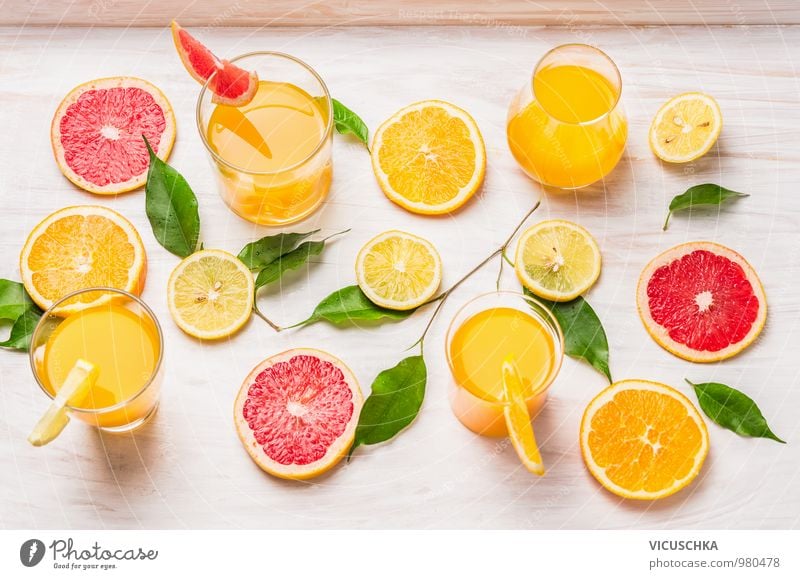 Citrus juices and pieces of orange, grapefruit and lemon Food Fruit Orange Nutrition Organic produce Vegetarian diet Diet Beverage Juice Glass Style Design