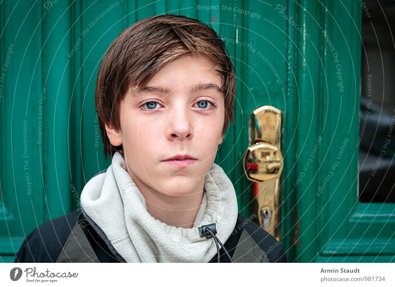 Portrait in front of the door Lifestyle Beautiful Human being Masculine Youth (Young adults) Head 1 13 - 18 years Child Autumn Winter Window Door Scarf Brunette