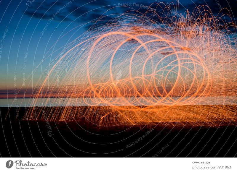 Painting of the future - flying sparking light spiral on the beach Beacon Coast Exterior shot Sky Landscape Colour photo Nature Vacation & Travel Tourism