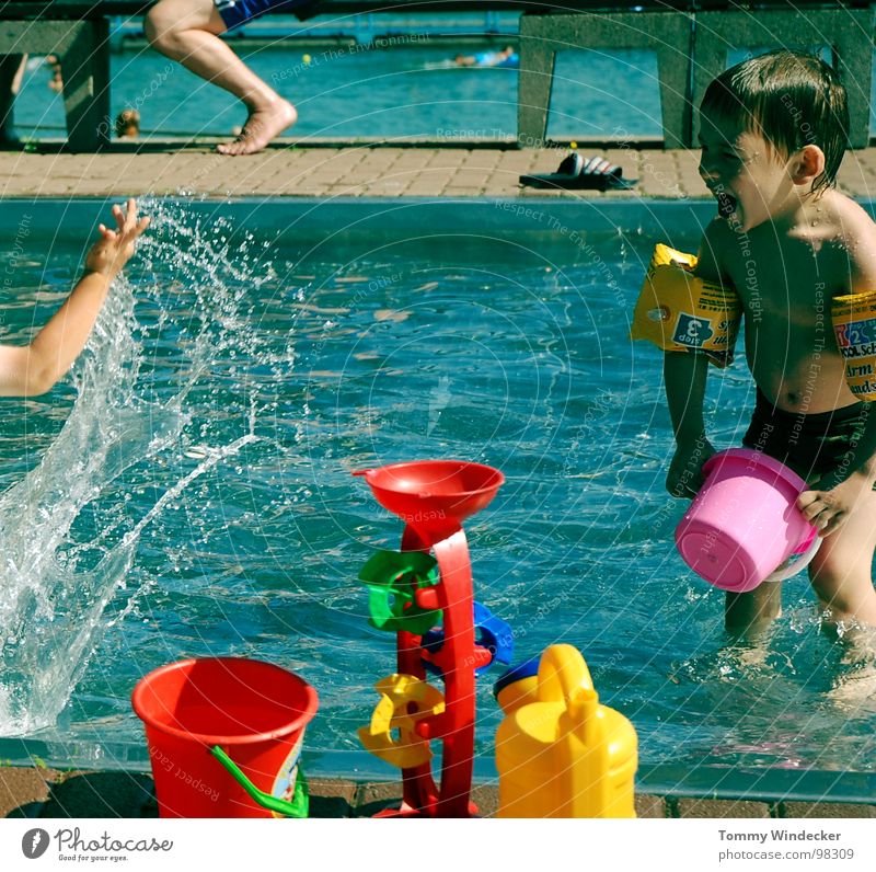 bathing fun Brave Wet Cold Refreshment Physics Swimming pool Swimming trunks Open-air swimming pool Bucket Red Yellow Playing Vacation & Travel