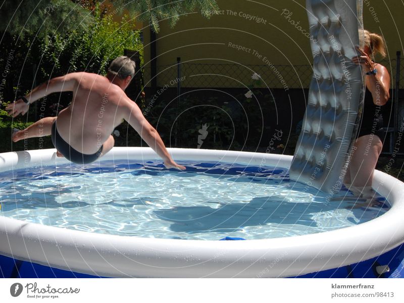 Oh you disc... Swimming pool Playing Wet Cooling Refrigeration Fat Jump Relaxation Action Air mattress Damp Water Blue Shadow Overweight Water basin Man Woman