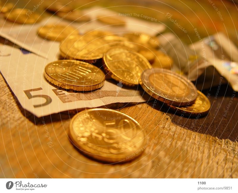 € (euros on table) Money Coin Euro cash Light (Natural Phenomenon)
