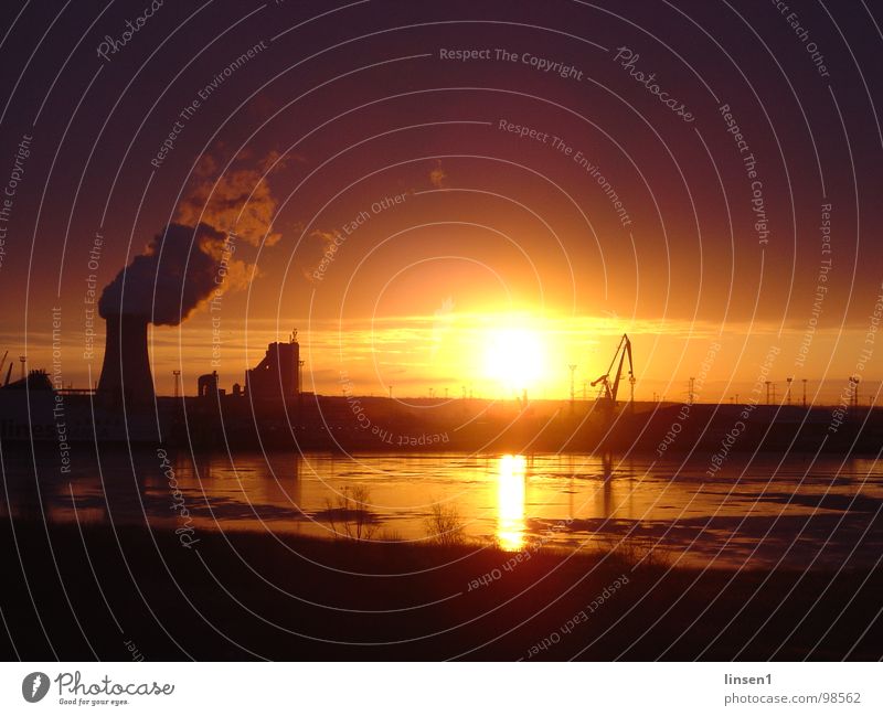 Overseas port Rostock at sunrise Sunrise Harbour powerhouse crane Warnov Water Coast Cooling tower