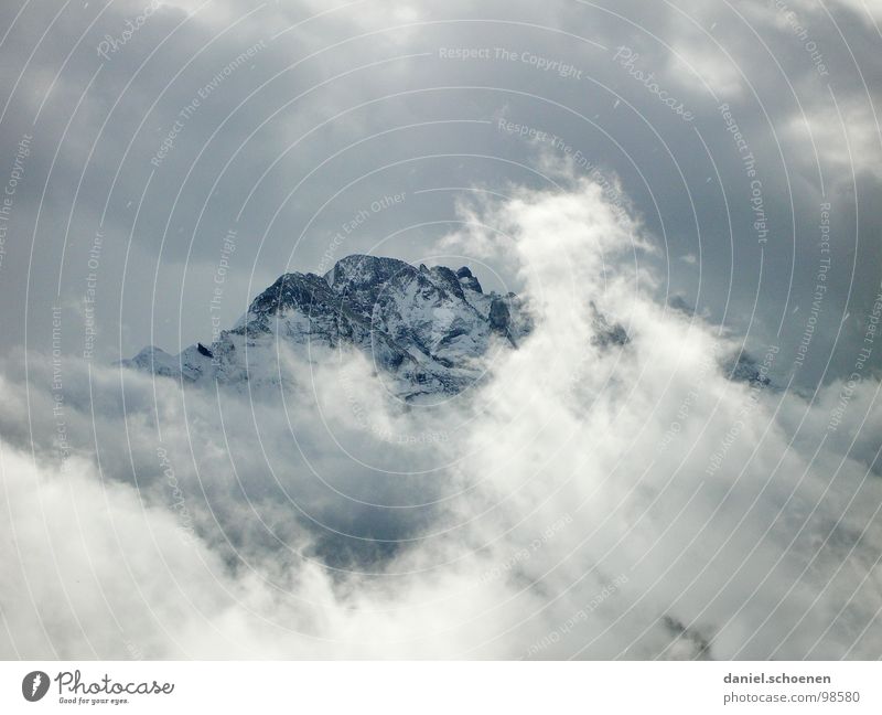 weather change Clouds Dramatic Threat Peak Mountaineering Hiking Switzerland Winter Alps Snow Ice Rock Point Weather Climbing
