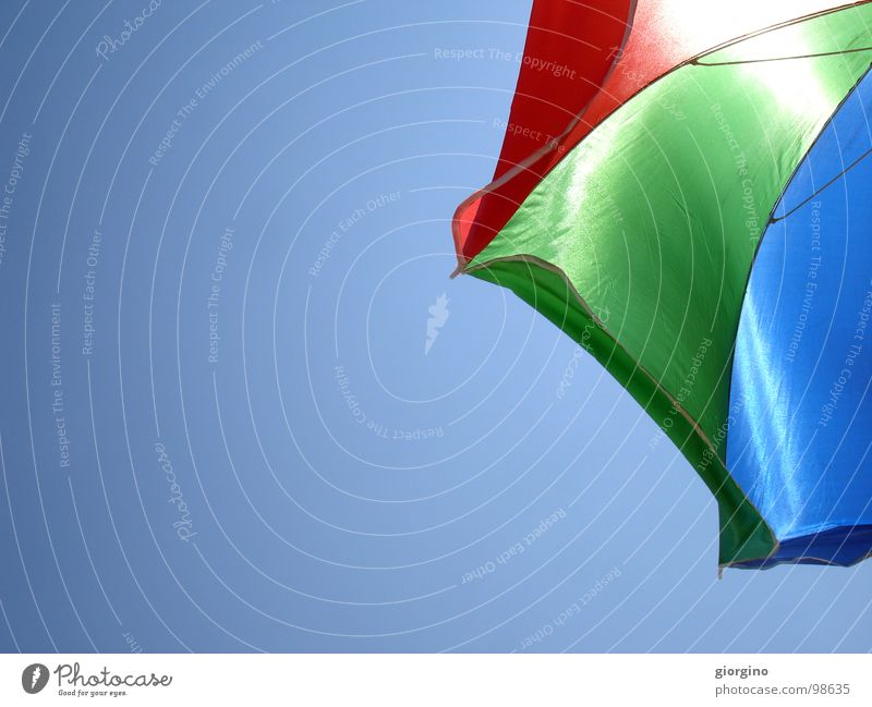 Umbrella at the seaside 1 Sky Background picture Colour Joy umbrella blue red black sea and composition free