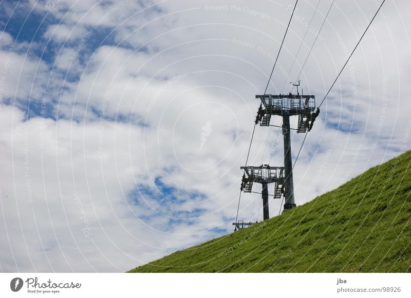 Summer break II Chair lift Wire 3 Slope Grass Clouds Bad weather Rope Mountain Tall Above Upward Electricity pylon Sky
