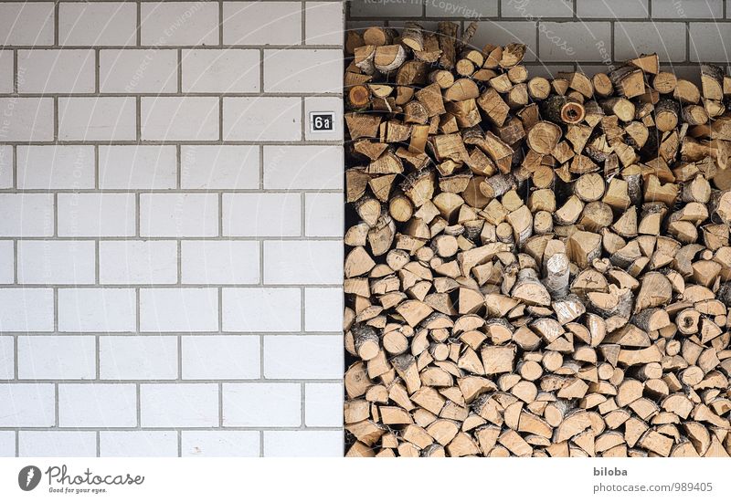 Trash! ¦ The heating period has begun Winter Stone Wood Environment wood beige Firewood House wall Wall (barrier) Fuel Nature Symbols and metaphors