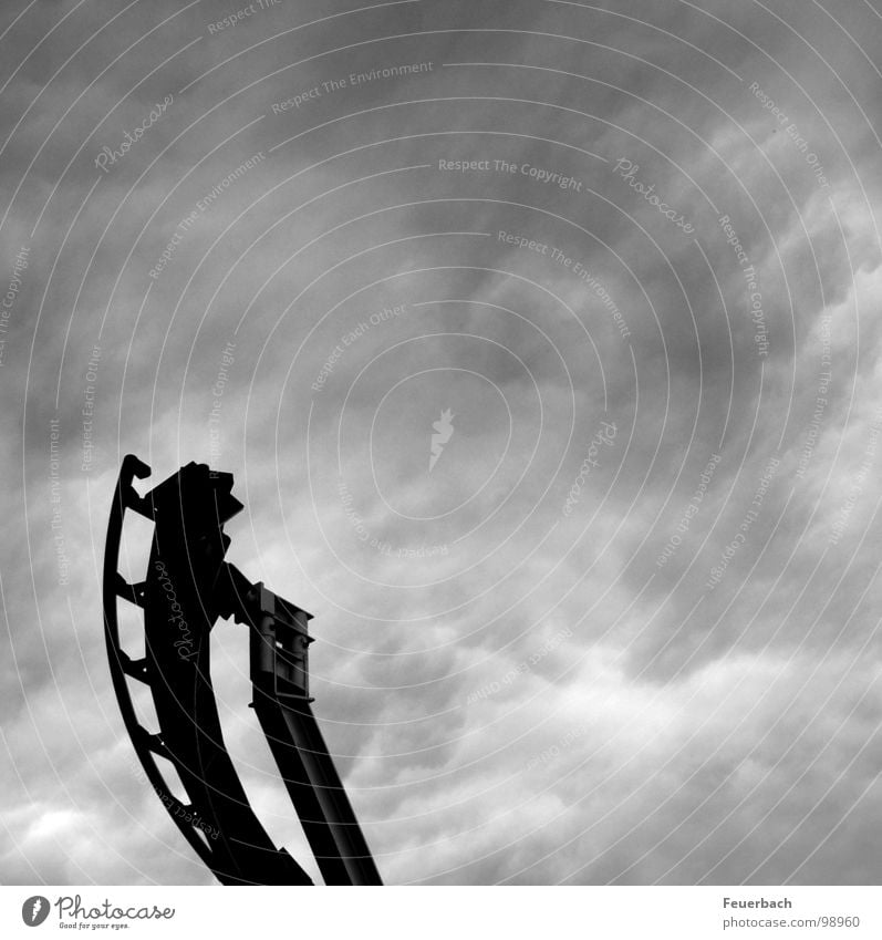 Roller coaster into nowhere Black & white photo Exterior shot Structures and shapes Deserted Contrast Freedom Fairs & Carnivals Sky Clouds Storm clouds Weather