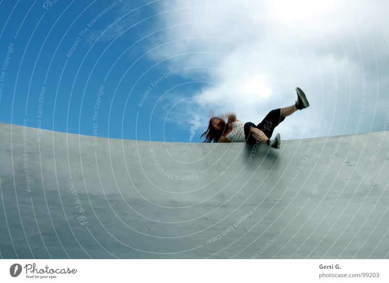 imbalance Brave To fall Woman Young woman Long-haired Footwear Chucks Articulated Dislocate Edge Edge of a plate Ramp Surface Wall (building) Sky blue Heavenly