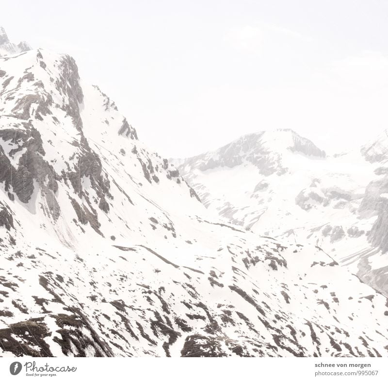 mountain air Environment Nature Elements Air Climate Lightning Ice Frost Snow Snowfall Hill Rock Alps Mountain Peak Snowcapped peak Glacier Black White Calm