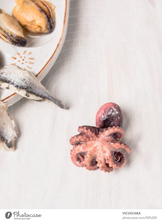 Baby octopus on white wooden table Food Seafood Nutrition Lunch Banquet Organic produce Diet Style Design Pink Octopus Background picture Mediterranean Squid