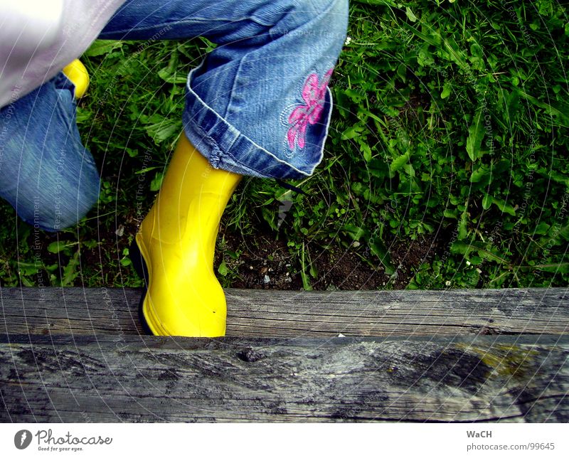 When it rains again Rubber boots Boots Rain Fence Wood Green Child Garden Park Toddler Canopy Lawn children rain shoes fence boards