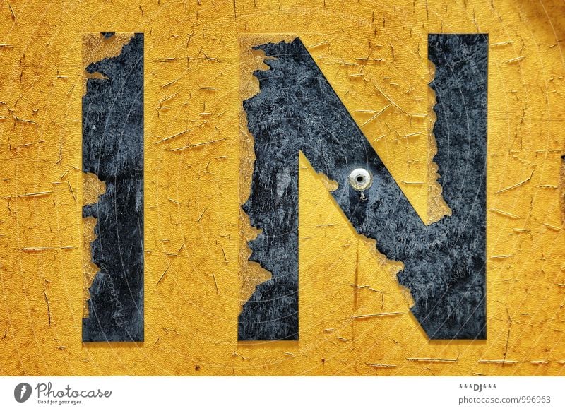 IN yellow and black | IN yellow and black Lifestyle Style Design Industry Art Work of art Media Stone Wood Metal Steel Rust Plastic Sign Characters