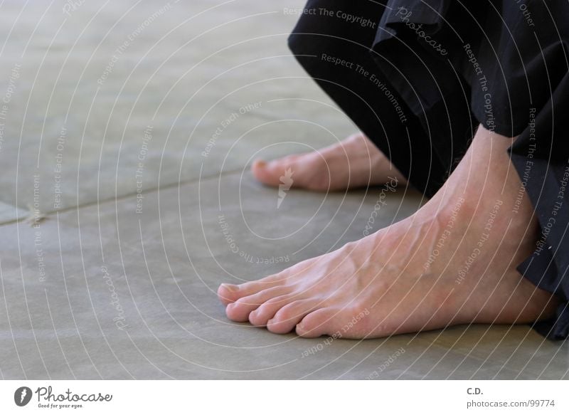 toe salute Toes Concrete - a Royalty Free Stock Photo from Photocase