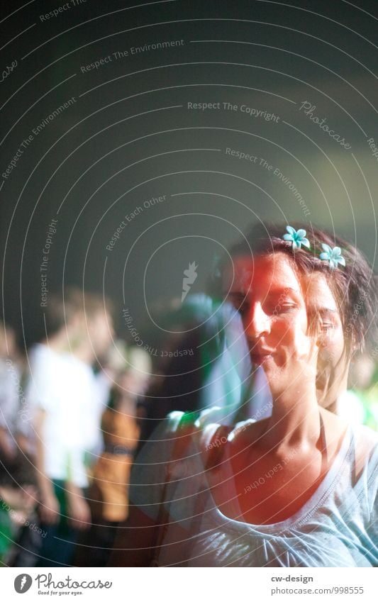 Woman with a flower in her hair Flower tart blurred Summer