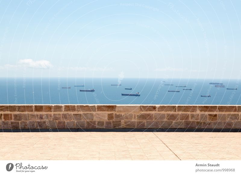 Wall and tanker Landscape Water Sky Sunlight Summer Beautiful weather Ocean Barcelona Port City Castle Wall (barrier) Wall (building) Tourist Attraction