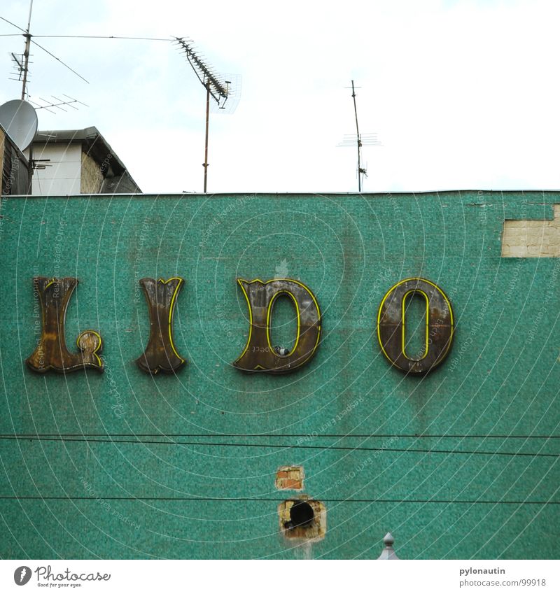Lido Turquoise Neon sign House (Residential Structure) Typography Roof Antenna Wall (building) Derelict Cable Sky