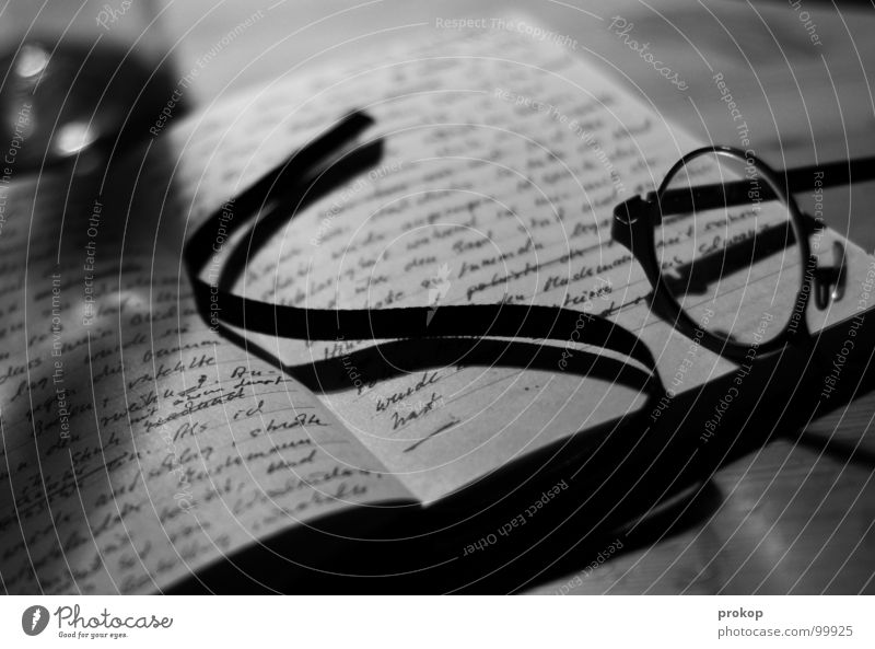 Notebook - II Piece of paper Eyeglasses Reading Letters (alphabet) Handwriting Poetic Closed Poem Word Diary Struck Table Depth of field Illegible Art Culture